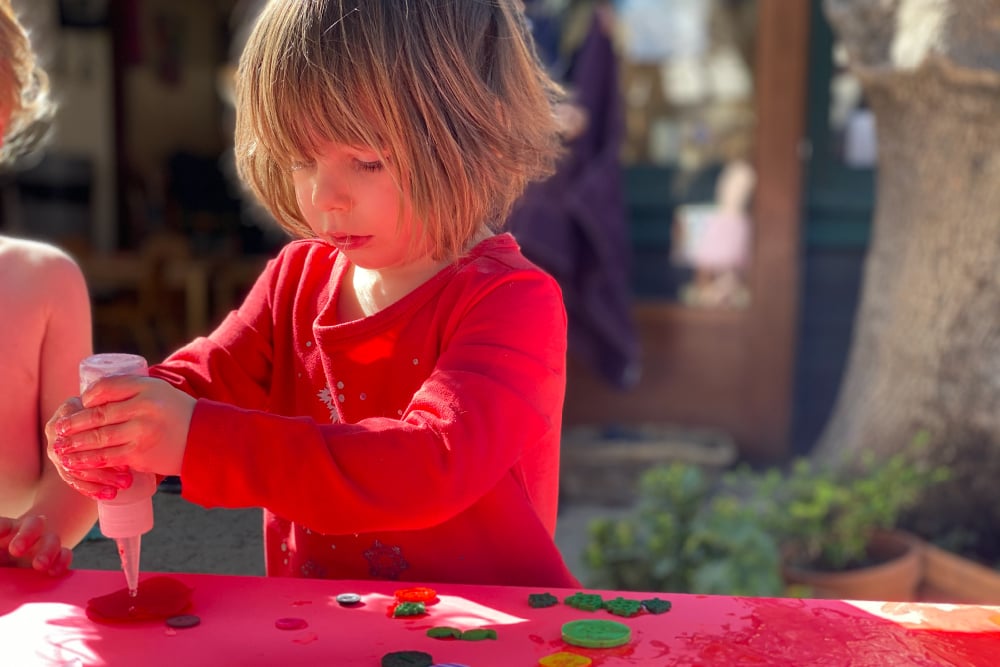 Child playing with paint